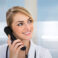Close-up Of Happy Female Doctor Talking On Telephone